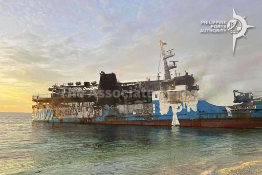 Death scene in burned ferry moves Filipino rescuers to... - Vimarsana News