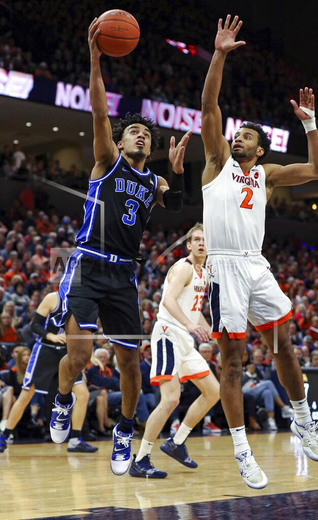 Andrew Shurtleff Duke guard Tre Jones (3) shoots as Virginia guard Braxton Key (2) defends during an NCAA college basketball game Saturday, Feb. 29, 2020, in Charlottesville, Va. (AP Photo/Andrew Shurtleff)