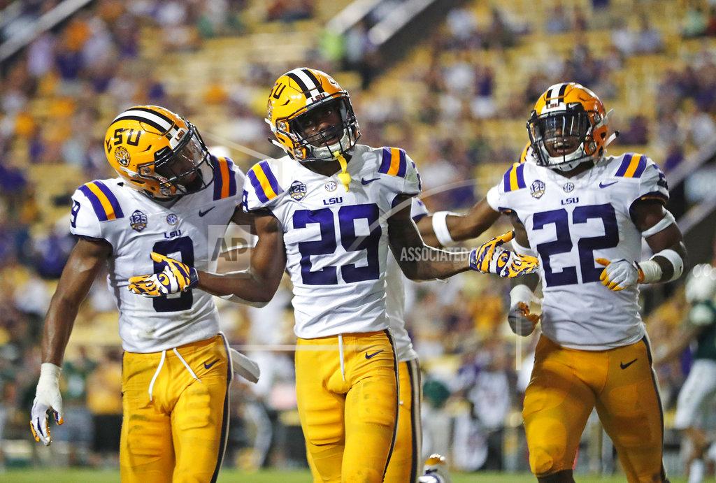 Gerald Herbert FILE - In this Sept. 8, 2018, file photo, LSU cornerback Greedy Williams (29) celebrates his interception with safety Grant Delpit (9) and cornerback Kristian Fulton (22) in the second half of an NCAA college football game against Southeastern Louisiana, in Baton Rouge, La. Greedy Williams, cornerback at LSU and a member of the preseason All-America team, will go up against fellow All-America preseason member Jerry Jeudy, a receiver at Alabama, on Saturday, Nov. 3 when No. 1 Alabama travels to Baton Rouge, La., to face No. 4 LSU. (AP Photo/Gerald Herbert, File)