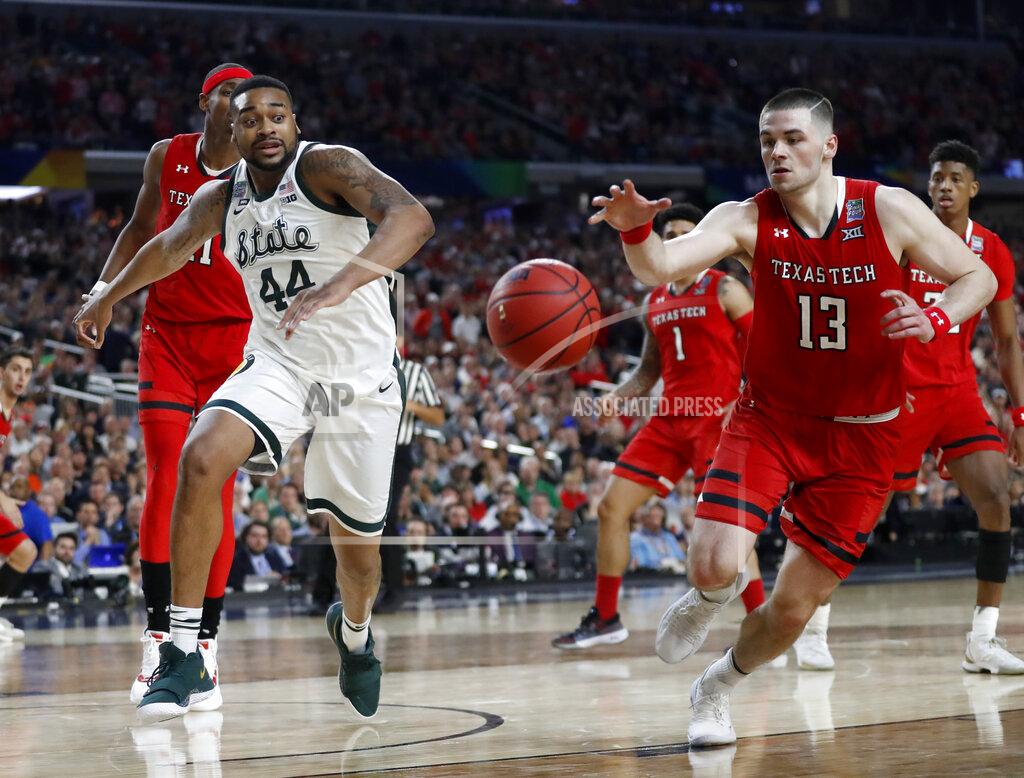 Jeff Roberson Texas Tech's Matt Mooney (13) chases a loose ball against Michigan State's Nick Ward (44) during the second half in the semifinals of the Final Four NCAA college basketball tournament, Saturday, April 6, 2019, in Minneapolis. (AP Photo/Jeff Roberson)