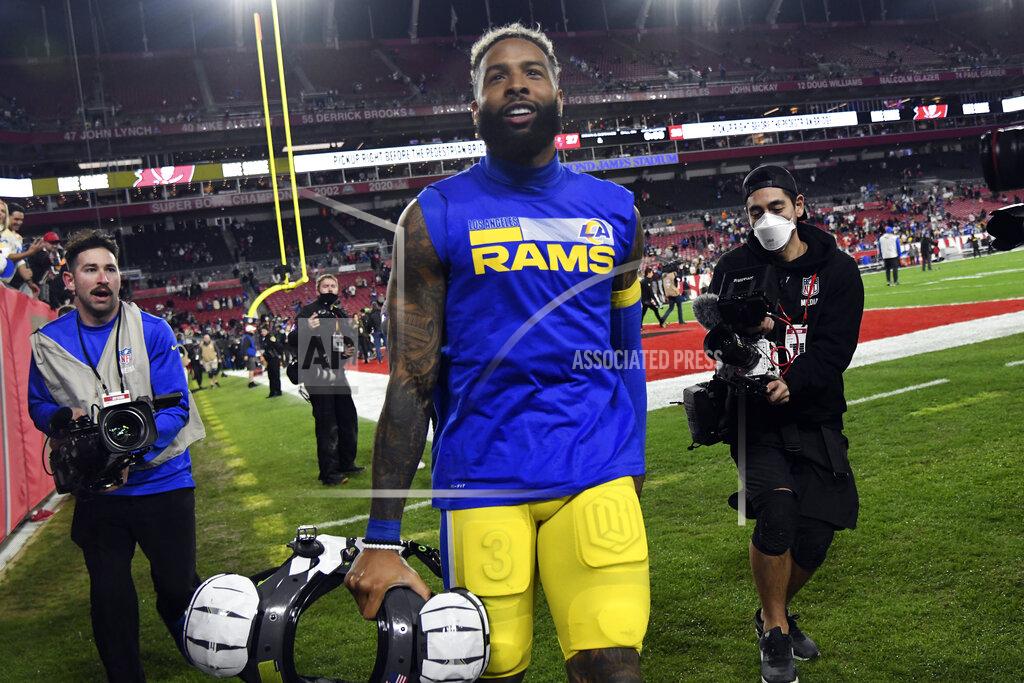 FILE - Los Angeles Rams wide receiver Odell Beckham Jr. (3) celebrates after the team defeated the Tampa Bay Buccaneers during an NFL divisional round playoff football game on Jan. 23, 2022, in Tampa, Fla. The Los Angeles Rams have not given up on re-signing Beckham, even if the injured receiver was decidedly unimpressed by their initial attempts to do so. (AP Photo/Jason Behnken, File)