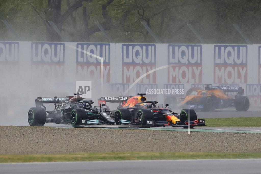 Luca Bruno Red Bull driver Max Verstappen of the Netherlands followed by Mercedes driver Lewis Hamilton of Britain lead the field after the start during the Emilia Romagna Formula One Grand Prix, at the Imola racetrack, Italy, Sunday, April 18, 2021. (AP Photo/Luca Bruno)