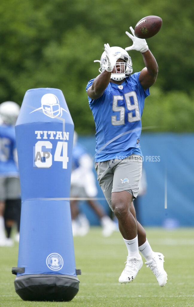 Duane Burleson Detroit Lions linebacker Tre Lamar (59) makes a catch during NFL football training camp Wednesday, June 5, 2019, in Allen Park, Mich. (AP Photo/Duane Burleson)