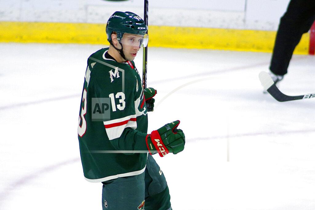 Andy Clayton-King Minnesota Wild center Nick Bonino (13) celebrates his goal against the Vegas Golden Knights in the first period during an NHL hockey game, Monday, May 3, 2021, in St. Paul, Minn. (AP Photo/Andy Clayton-King)