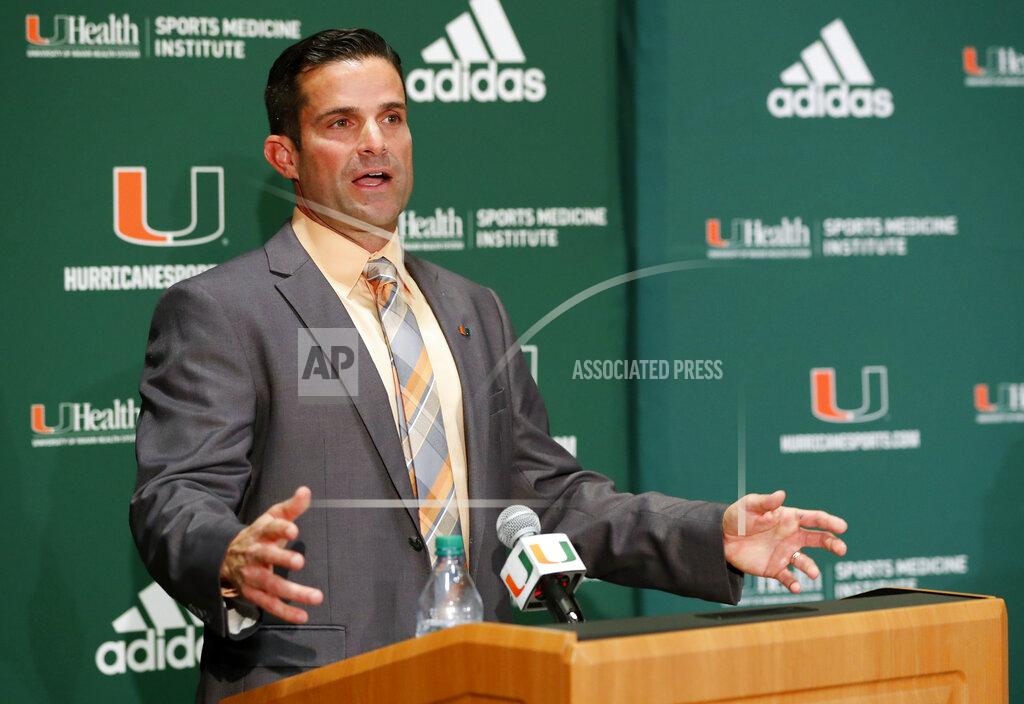 Wilfredo Lee FILE - In this Wednesday, Jan. 2, 2019 file photo, Manny Diaz speaks during a news conference after being named Miami's new NCAA college football head coach in Coral Gables, Fla. Florida State and Miami were hoping signing day could help put to the negativity of 2018 to rest and provide a push toward better times. Miami, coming off a 7-6 season and coach Mark Richt's surprising retirement, managed to finally provide some good news for Hurricanes fans. New coach Manny Diaz bolstered the 'Canes recruiting class with some high-profile transfers. (AP Photo/Wilfredo Lee, File)