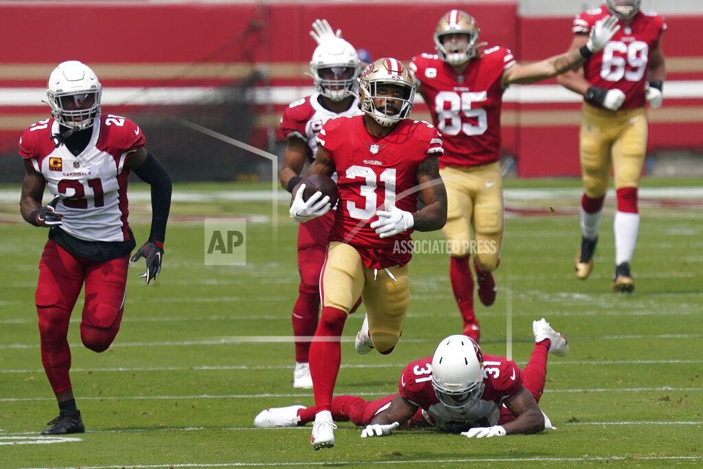 Tony Avelar San Francisco 49ers running back Raheem Mostert (31) runs toward the end zone to score a touchdown against the Arizona Cardinals during the first half of an NFL football game in Santa Clara, Calif., Sunday, Sept. 13, 2020. (AP Photo/Tony Avelar)