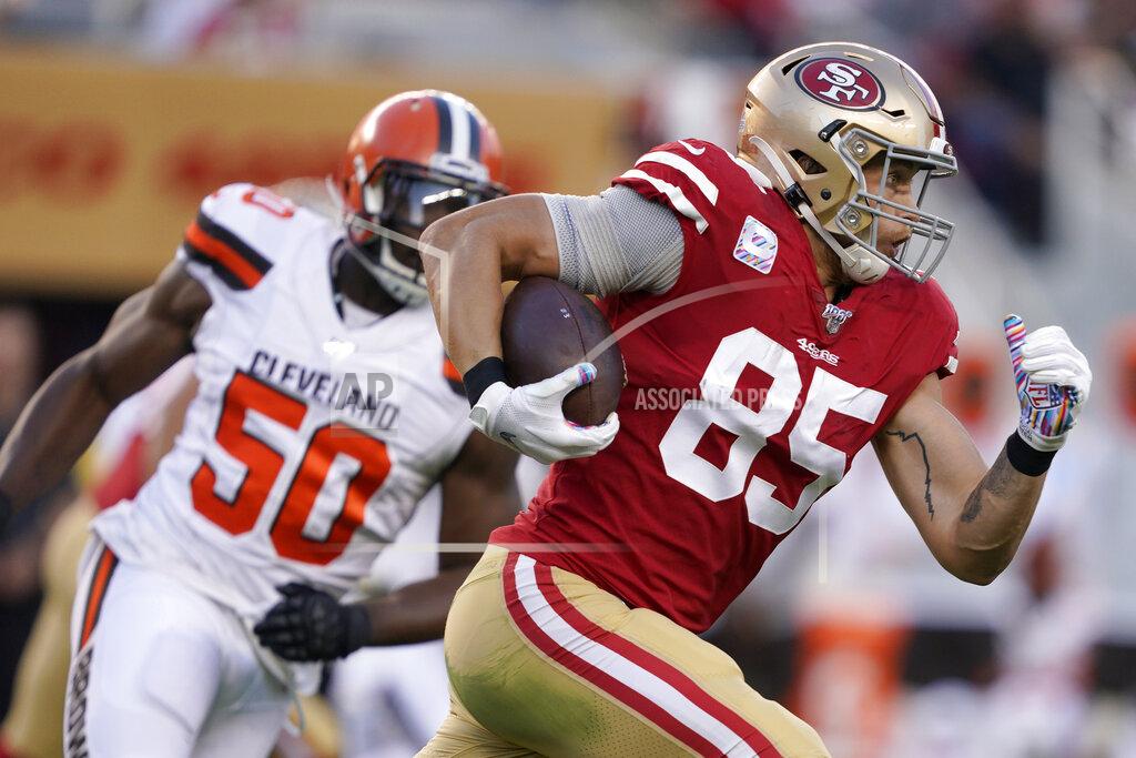 Tony Avelar San Francisco 49ers tight end George Kittle (85) runs in front of Cleveland Browns defensive end Chris Smith (50) during the first half of an NFL football game in Santa Clara, Calif., Monday, Oct. 7, 2019. (AP Photo/Tony Avelar)
