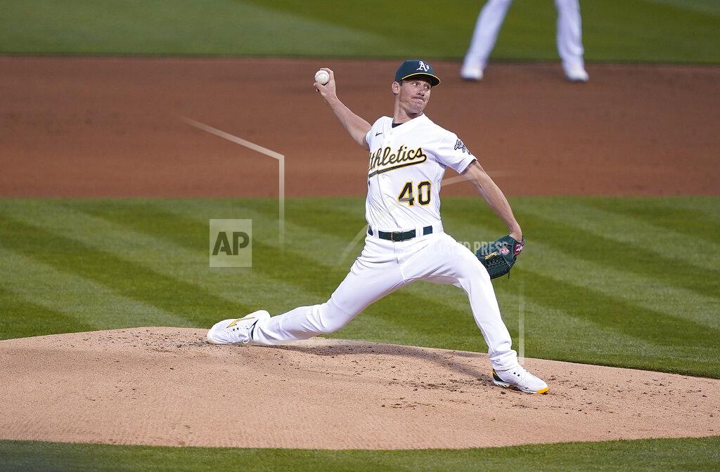 Tony Avelar Oakland Athletics pitcher Chris Bassitt (40) throws against the Houston Astros in the second inning of an opening day baseball game Oakland, Calif., Thursday, April 1, 2021. (AP Photo/Tony Avelar)