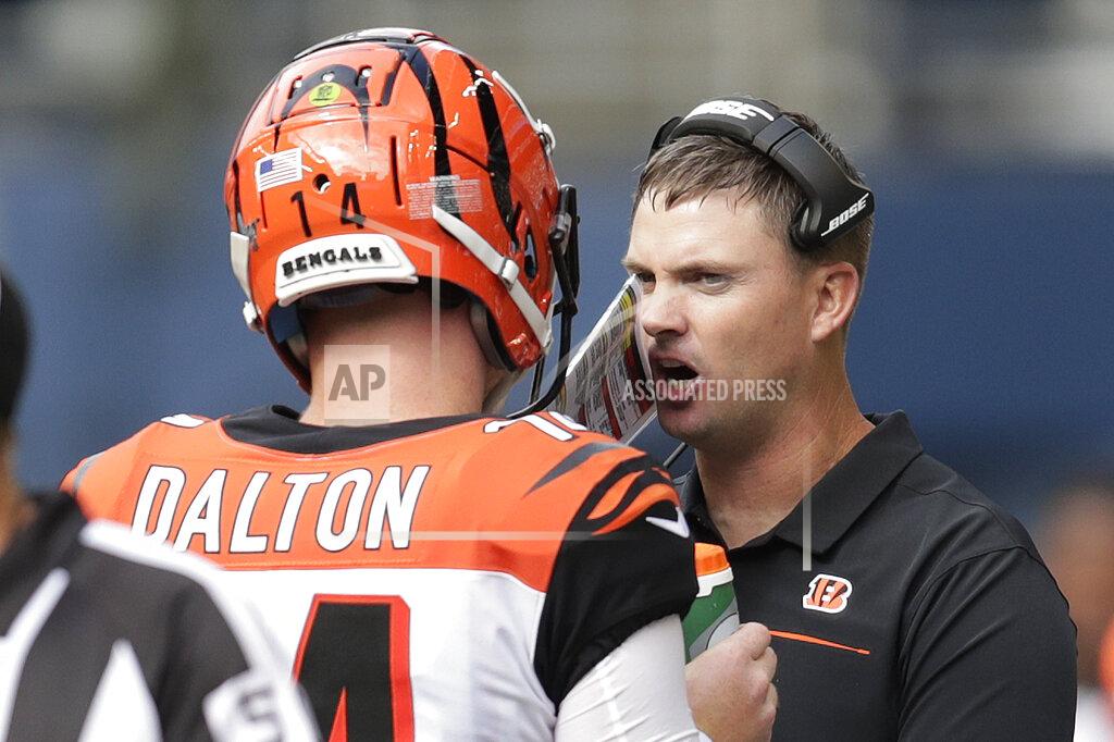 Stephen Brashear Cincinnati Bengals head coach Zac Taylor, right, talks with quarterback Andy Dalton, left, during the second half of an NFL football game against the Seattle Seahawks, Sunday, Sept. 8, 2019, in Seattle. (AP Photo/Stephen Brashear)