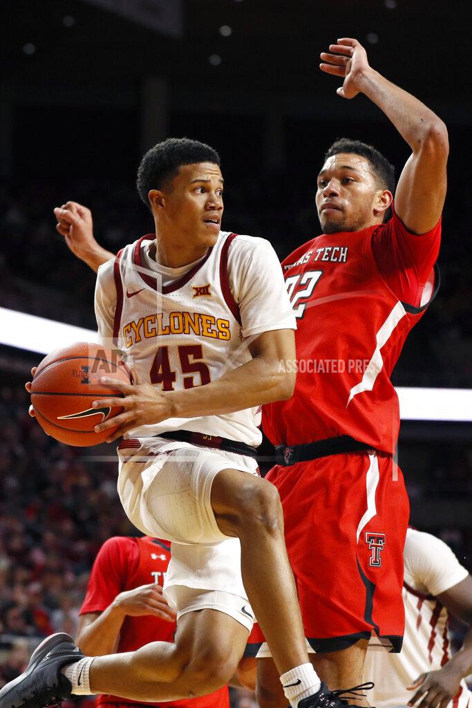 Charlie Neibergall Iowa State guard Rasir Bolton (45) drives past Texas Tech forward TJ Holyfield, right, during the first half of an NCAA college basketball game Saturday, Feb. 22, 2020, in Ames, Iowa. (AP Photo/Charlie Neibergall)