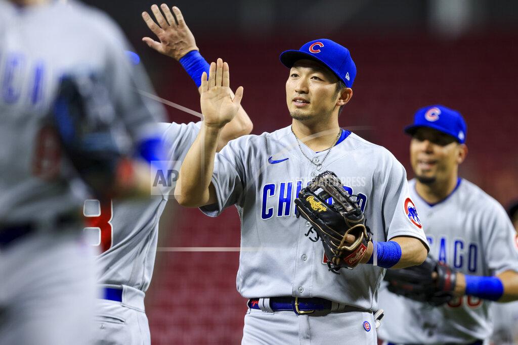 Aaron Doster Chicago Cubs' Seiya Suzuki high-fives teammates after the final out of a baseball game against the Cincinnati Reds in Cincinnati, Tuesday, May 24, 2022. The Cubs won 11-4. (AP Photo/Aaron Doster)