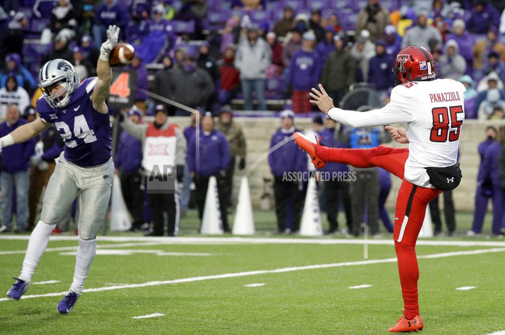 Orlin Wagner Kansas State defensive back Brock Monty (24) blocks a punt by Texas Tech punter Dominic Panazzolo (85) during the second half of an NCAA college football game in Manhattan, Kan., Saturday, Nov. 17, 2018. (AP Photo/Orlin Wagner)