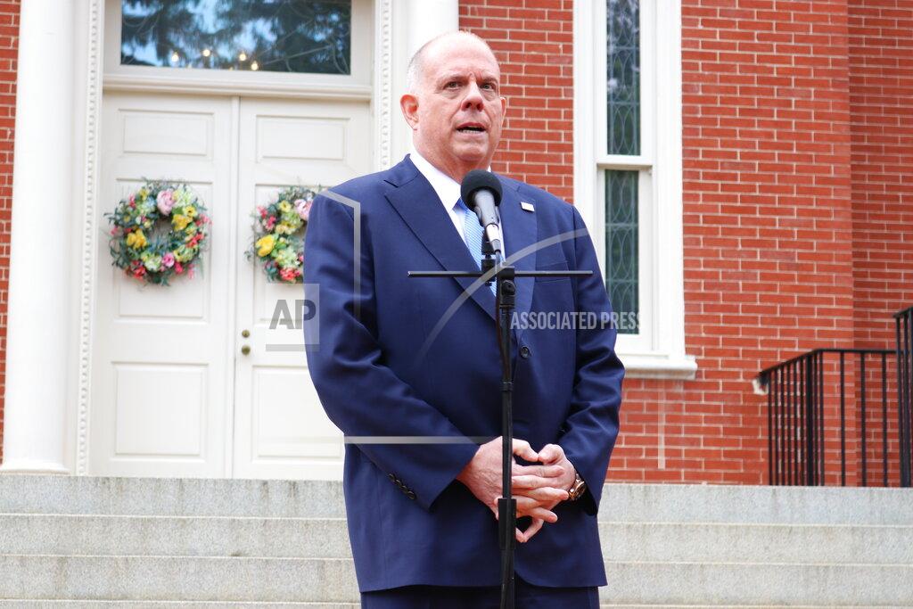 Maryland Gov. Larry Hogan talks to reporters at the governor's residence on the last day of the state's legislative session on Monday, April 12, 2021 in Annapolis, Md. Hogan, a Republican, praised bipartisan cooperation on pandemic relief legislation and on an agreement on how to allocate $3.9 billion in federal relief. (AP Photo/Brian Witte)