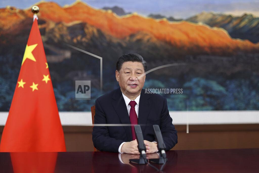 In this photo released by Xinhua News Agency, Chinese President Xi Jinping delivers a keynote speech via video for the opening ceremony of the Boao Forum for Asia (BFA) Annual Conference, in Beijing Tuesday, April 20, 2021. Xi on Tuesday called for more equitable management of global affairs and, in an implicit rejection of U.S. dominance, said governments shouldn't be allowed to impose rules on others. (Ju Peng/Xinhua via AP)