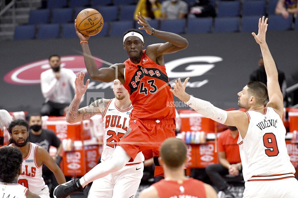 Jason Behnken Toronto Raptors forward Pascal Siakam (43) looks to pass the ball against the Chicago Bulls during the second half of an NBA basketball game Thursday, April 8, 2021, in Tampa, Fla. (AP Photo/Jason Behnken)
