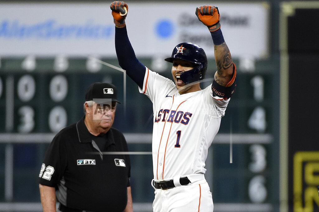 Eric Christian Smith Houston Astros' Carlos Correa celebrates his double during the sixth inning of the team's baseball game against the Cleveland Indians, Tuesday, July 20, 2021, in Houston. (AP Photo/Eric Christian Smith)