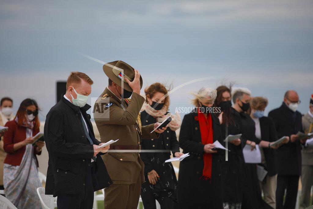 Emrah Gurel Dignitaries and military personnel attend a ceremony to commemorate soldiers who died during the World War I campaign on the Gallipoli peninsula, in Canakkale, Turkey, Saturday, April 24, 2021, a day ahead of the 106th anniversary of the Gallipoli Campaign.The Gallipoli Campaign of 1915 by Allied forces aimed to take control of the peninsula to weaken the Ottoman Empire. The campaign failed and Allied forces withdrew after eight months of fighting on the ground and some 250,000 casualties on both sides. The memorials were kept small due to the COVID-19 pandemic.(AP Photo/Emrah Gurel)