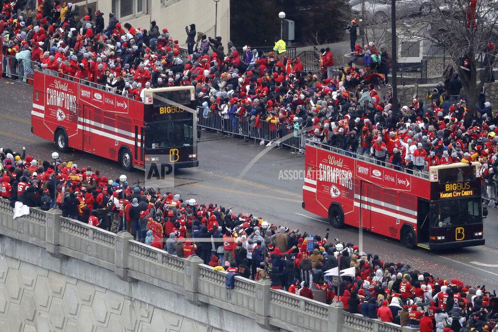 Charlie Riedel Busses carrying members of the Kansas City Chiefs travel in a parade through downtown Kansas City, Mo., Wednesday, Feb. 5, 2020, to celebrate the Chiefs victory in the NFL's Super Bowl 54. (AP Photo/Charlie Riedel)