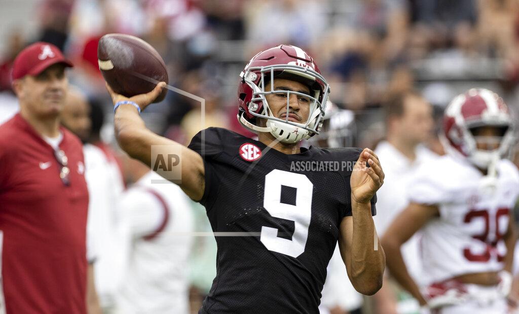 Vasha Hunt Alabama quarterback Bryce Young (9) throws before Alabama's A-Day NCAA college football scrimmage, Saturday, April 16, 2022, in Tuscaloosa, Ala. (AP Photo/Vasha Hunt)