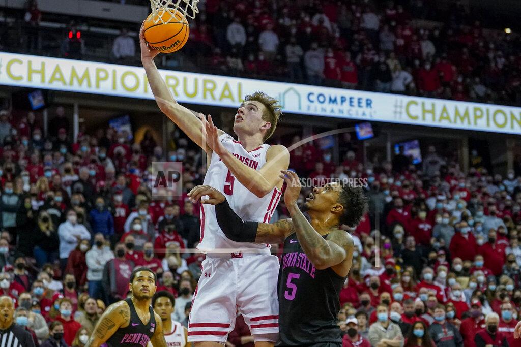 Andy Manis Wisconsin's Tyler Wahl (5) shoots the winning basket against Penn State's Greg Lee (5) during the second half of an NCAA college basketball game Saturday, Feb. 5, 2022, in Madison, Wis. (AP Photo/Andy Manis)