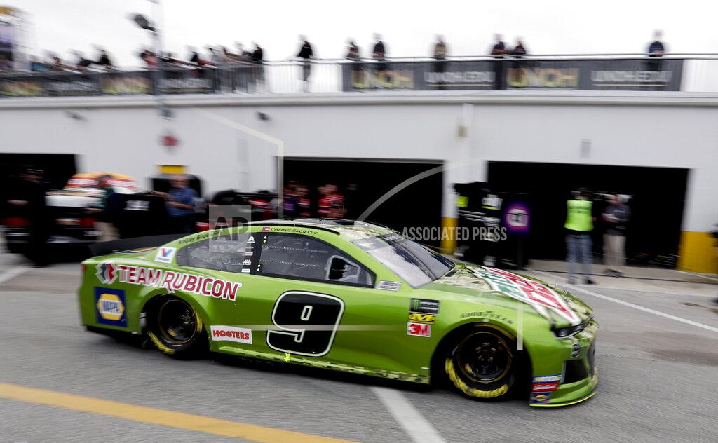 John Raoux Chase Elliott (9) drives through the garage area during NASCAR auto race practice at Daytona International Speedway, Saturday, Feb. 9, 2019, in Daytona Beach, Fla. (AP Photo/John Raoux)