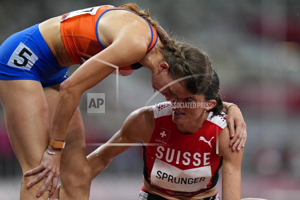 Petr David Josek Femke Bol, left, of the Netherlands, embraces Lea Sprunger, of Switzerland, after their semifinal of the women's 400-meter hurdles at the 2020 Summer Olympics, Monday, Aug. 2, 2021, in Tokyo. (AP Photo/Petr David Josek)