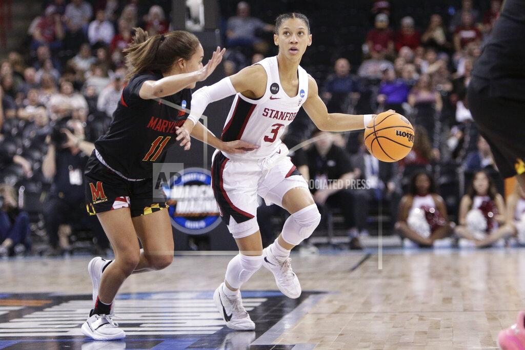 Young Kwak Stanford guard Anna Wilson (3) fends off Maryland guard Katie Benzan (11) during the first half of a college basketball game in the Sweet 16 round of the NCAA tournament, Friday, March 25, 2022, in Spokane, Wash. (AP Photo/Young Kwak)