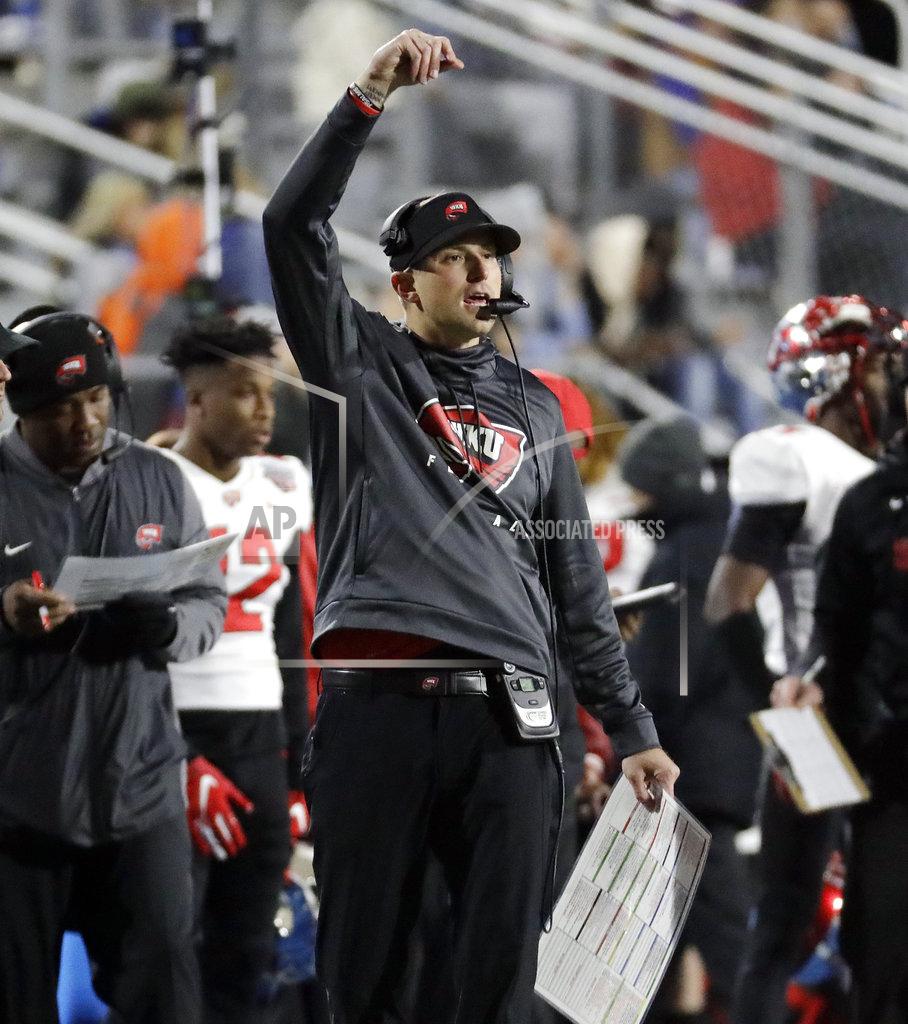Mark Humphrey Western Kentucky head coach Mike Sanford directs his players in the first half of an NCAA college football game against Middle Tennessee, Friday, Nov. 2, 2018, in Murfreesboro, Tenn. (AP Photo/Mark Humphrey)
