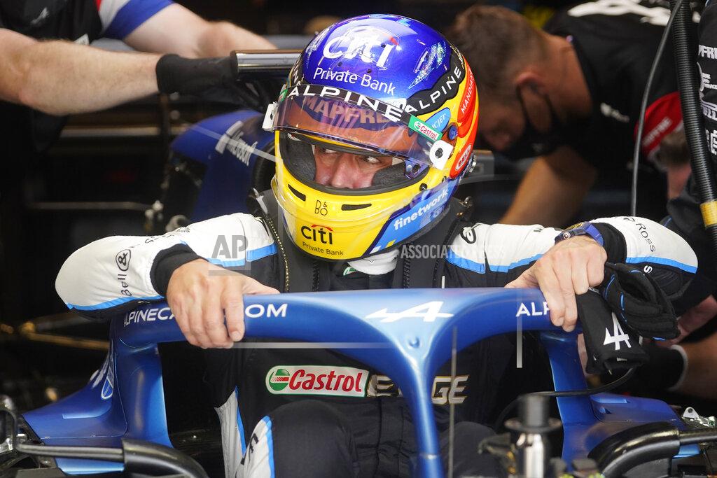 Darron Cummings Alpine driver Fernando Alonso, of Spain, climbs into his car during a practice session for the F1 US Grand Prix auto race at the Circuit of the Americas, Friday, Oct. 22, 2021, in Austin, Texas. (AP Photo/Darron Cummings)