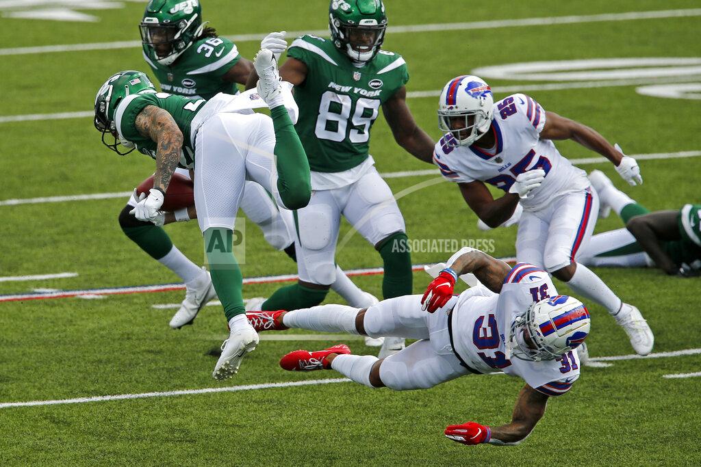John Munson New York Jets safety Ashtyn Davis (32) is upended while returning a kick off by Buffalo Bills strong safety Dean Marlowe (31) during the second half of an NFL football game in Orchard Park, N.Y., Sunday, Sept. 13, 2020. The Bills won 27-17. (AP Photo/John Munson)