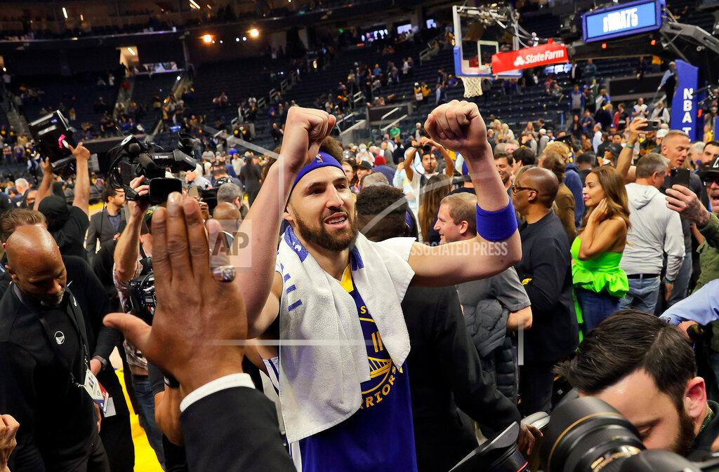 Carlos Avila Gonzalez Golden State Warriors' Klay Thompson celebrates the team's win over the Memphis Grizzlies in Game 6 of the Western Conference semifinals of the NBA basketball playoffs in San Francisco on Friday, May 13, 2022. The Warriors won 110-96 to advance to the conference finals. (Carlos Avila Gonzalez/San Francisco Chronicle via AP)