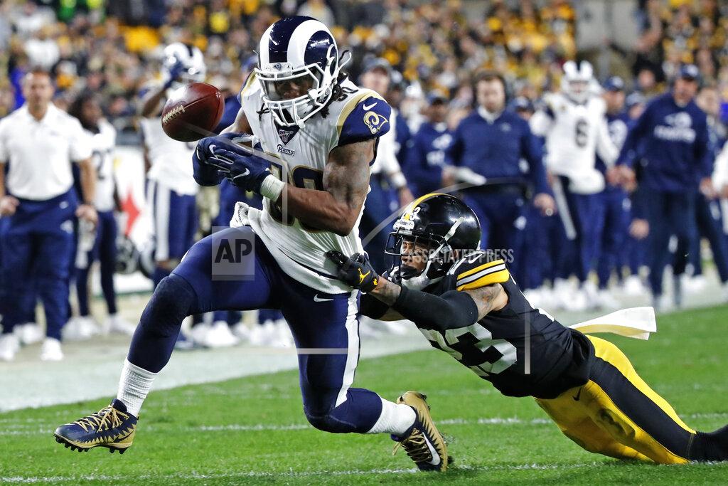 Don Wright Los Angeles Rams running back Todd Gurley (30) loses the ball as he is tackled by Pittsburgh Steelers cornerback Joe Haden (23) during the second half of an NFL football game in Pittsburgh, Sunday, Nov. 10, 2019. The ball went out of bounds on the play. (AP Photo/Don Wright)