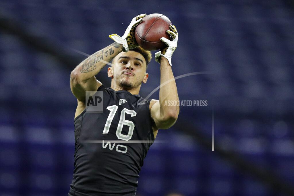 Michael Conroy Washington wide receiver Aaron Fuller runs a drill at the NFL football scouting combine in Indianapolis, Thursday, Feb. 27, 2020. (AP Photo/Michael Conroy)