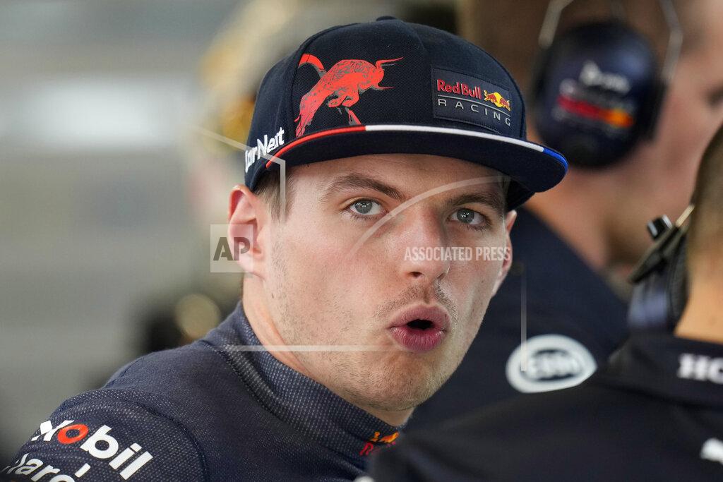 Manu Fernandez Red Bull driver Max Verstappen of the Netherlands grimaces at pits during practice session at the Barcelona Catalunya racetrack in Montmelo, Spain, Friday, May 20, 2022. The Formula One race will be held on Sunday. (AP Photo/Manu Fernandez)