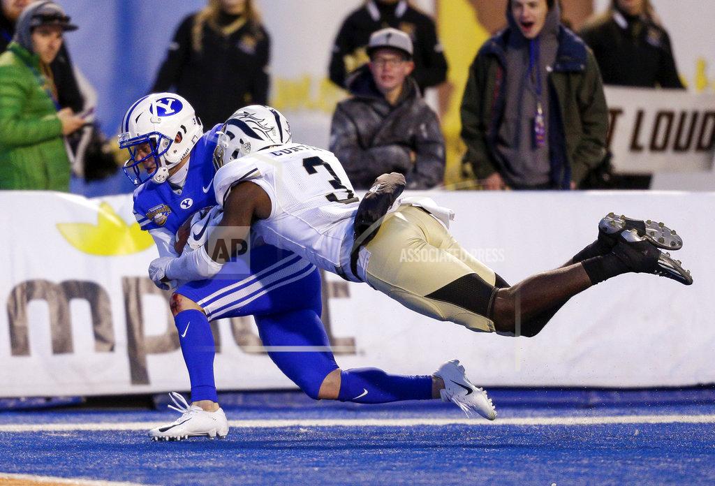Steve Conner BYU wide receiver Dylan Collie, left, is tackled by Western Michigan defensive back Anton Cutris (3) after a 41-yard reception late in the second half of the Famous Idaho Potato Bowl NCAA college football game, Friday, Dec. 21, 2018, in Boise, Idaho. (AP Photo/Steve Conner)