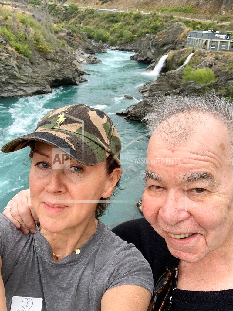 Fiona Prine This 2019 photo provided by Fiona Prine shows Prine and husband John in New Zealand. Both battled COVID-19, but John lost his life to the disease. (Fiona Prine via AP)