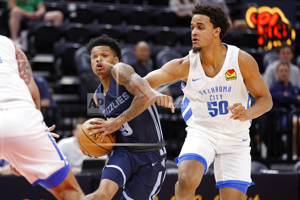 Jeff Swinger Memphis Grizzlies guard Ronaldo Segu (9) drives to the basket against Oklahoma City Thunder forward Jeremiah Robinson-Earl (50) during the first half of an NBA summer league basketball game Wednesday, July 6, 2022, in Salt Lake City. (AP Photo/Jeff Swinger)