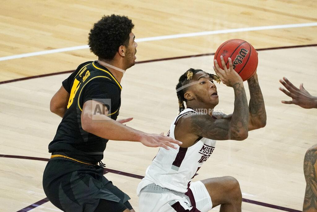 Rogelio V. Solis Mississippi State guard Deivon Smith, right, looks for a shot next to Missouri guard Mark Smith (13) during the first half of an NCAA college basketball game, Tuesday, Jan. 5, 2021, in Starkville, Miss. (AP Photo/Rogelio V. Solis)