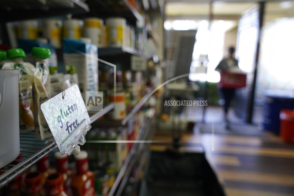 A gluten free section at Porchlight Community Service food pantry is seen Thursday, May 6, 2021, in San Diego. For millions of Americans with food allergies or intolerances, the pandemic has created a particular crisis: Most food banks and government programs offer limited options. (AP Photo/Gregory Bull)