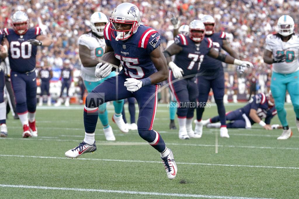 Steven Senne New England Patriots wide receiver Nelson Agholor (15) heads for the end zone after a touchdown pass from New England Patriots quarterback Mac Jones during the first half of an NFL football game against the Miami Dolphins, Sunday, Sept. 12, 2021, in Foxborough, Mass. (AP Photo/Steven Senne)