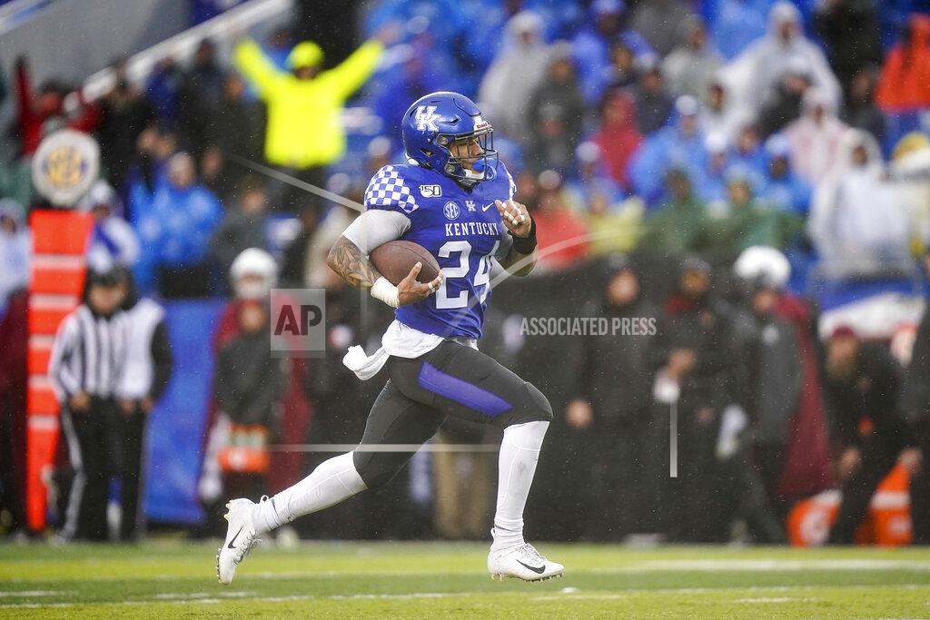 Bryan Woolston Kentucky running back Christopher Rodriguez Jr. (24) runs for a touchdown during the second half of the NCAA college football game against Louisville, Saturday, Nov. 30, 2019, in Lexington, Ky. (AP Photo/Bryan Woolston)