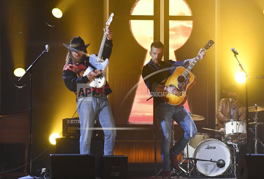 Amy Harris John Osborne, left, and T.J. Osborne, of Brothers Osborne, perform at the 56th annual Academy of Country Music Awards on Sunday, April 18, 2021, at the Ryman Auditorium in Nashville, Tenn. (Photo by Amy Harris/Invision/AP)