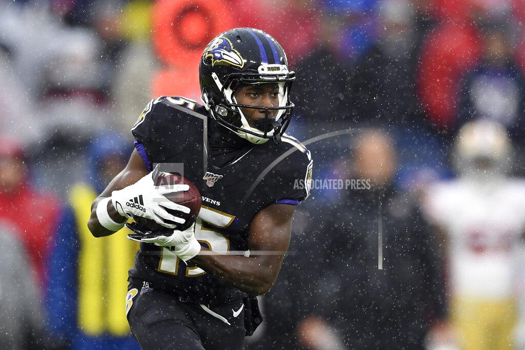 Nick Wass FILE - In this Dec. 1, 2019, file photo, Baltimore Ravens wide receiver Marquise Brown (15) runs with the ball during the first half of an NFL football game against the San Francisco 49ers in Baltimore, Md. Brown put up some respectable numbers as a rookie last year with the Ravens, leading the team's wide receivers in receptions and touchdowns as the primary downfield target for NFL MVP Lamar Jackson. (AP Photo/Nick Wass, File)