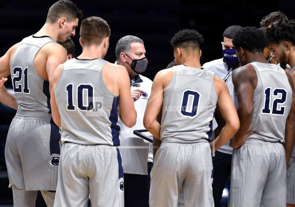 Abby Drey Penn State interim coach Jim Ferry talk to his players before the second half against VCU in an NCAA college basketball game Wednesday, Dec. 2, 2020, in State College, Pa. (Abby Drey/Centre Daily Times via AP)