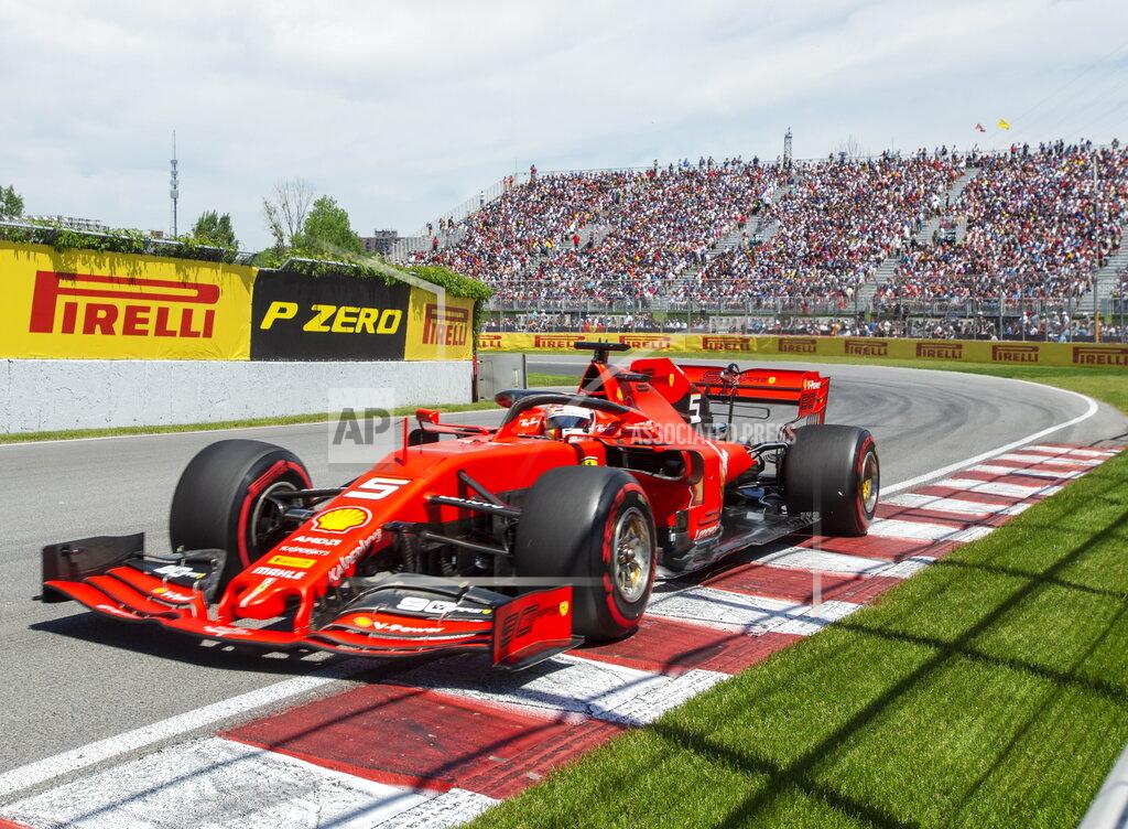 Ryan Remiorz Ferrari driver Sebastian Vettel of Germany drives through the Senna corner during qualifying for the Formula One Canadian Grand Prix auto race in Montreal, Saturday, June 8, 2019. (Ryan Remiorz/The Canadian Press via AP)
