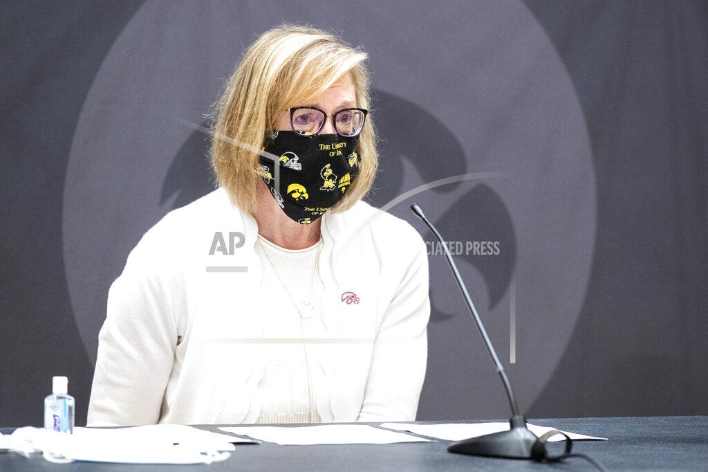 Joseph Cress Sarah Hansen, vice president for student life, wears a face mask while speaking during a news conference amid the novel coronavirus pandemic, Monday, Aug. 10, 2020, at the Iowa Memorial Union on the University of Iowa campus in Iowa City, Iowa. (Joseph Cress/Iowa City Press-Citizen via AP)