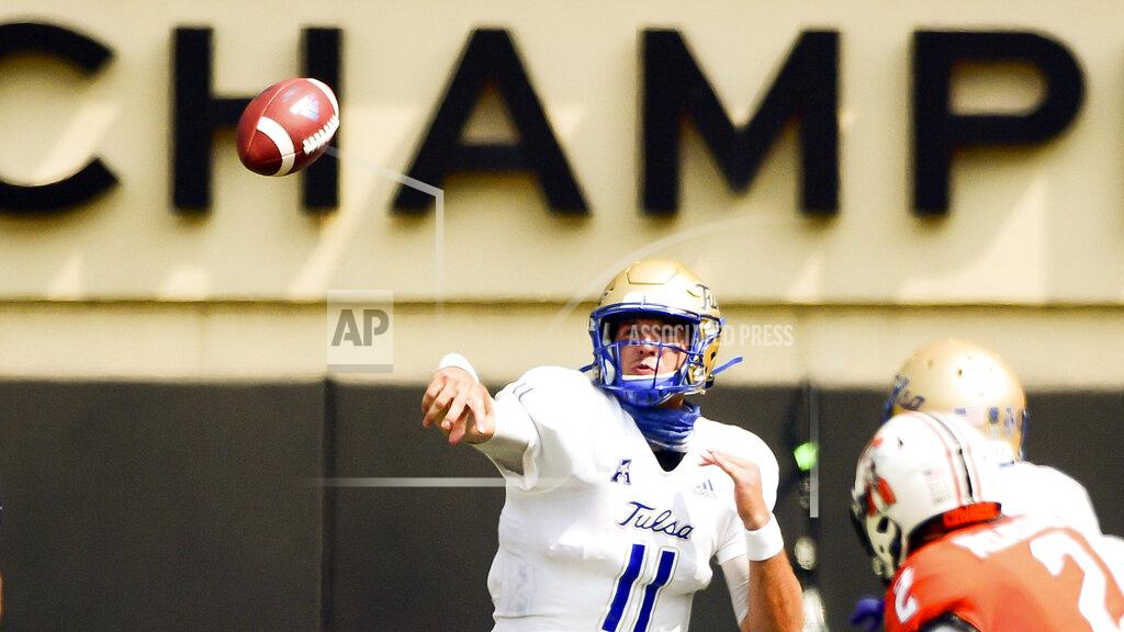 Brody Schmidt Tulsa quarterback Zach Smith throws a pass in the second half of an NCAA college football game against Oklahoma State, Saturday, Sept. 19, 2020, in Stillwater, Okla. (AP Photo/Brody Schmidt)
