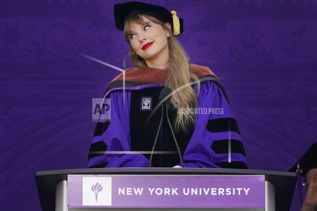 Seth Wenig Taylor Swift speaks during a graduation ceremony for New York University at Yankee Stadium in New York, Wednesday, May 18, 2022. (AP Photo/Seth Wenig)