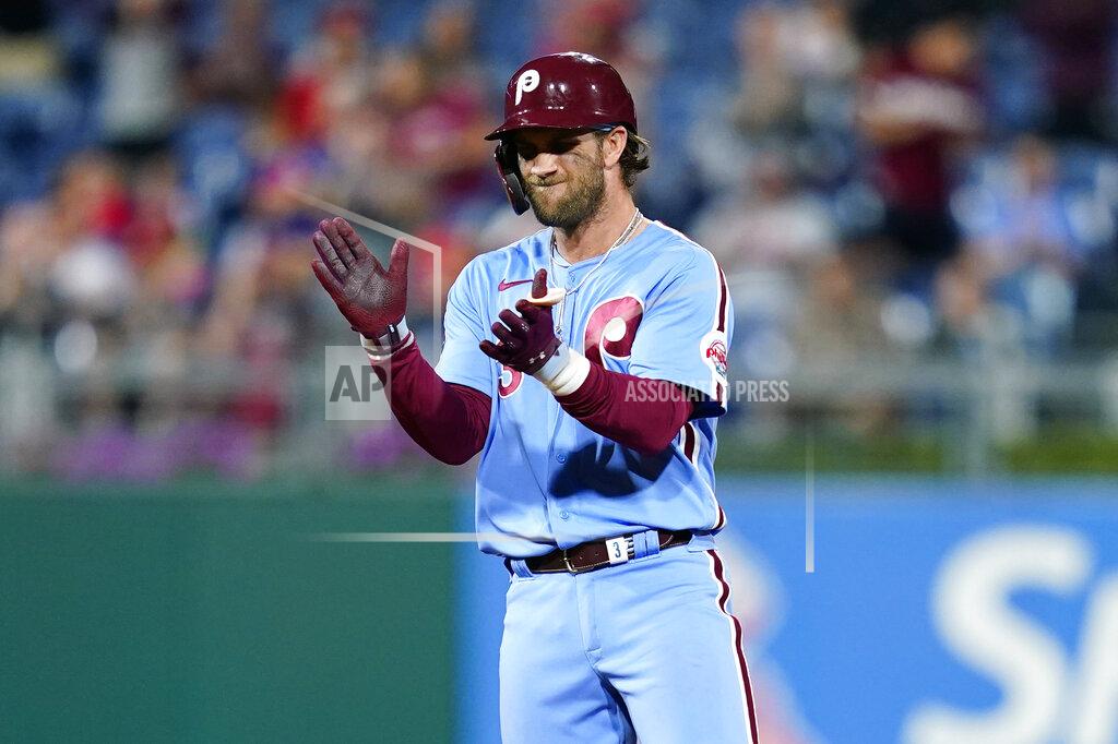 Matt Slocum Philadelphia Phillies' Bryce Harper reacts after hitting an RBI-double against Chicago Cubs pitcher Manuel Rodriguez during the sixth inning of a baseball game, Thursday, Sept. 16, 2021, in Philadelphia. (AP Photo/Matt Slocum)