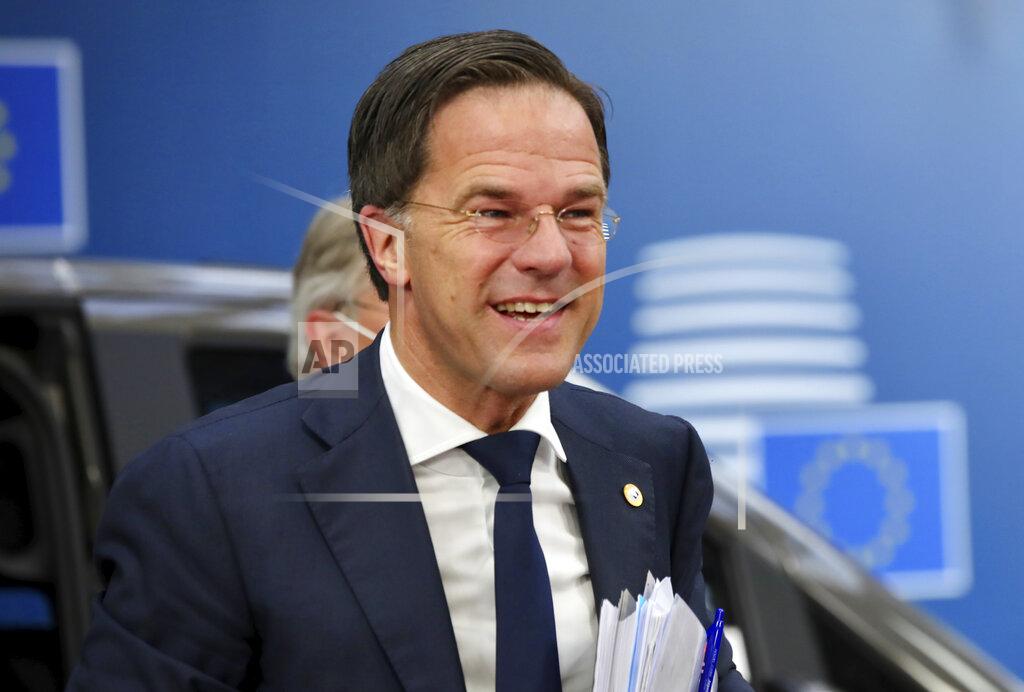Olivier Matthys FILE - In this file photo dated Saturday, July 18, 2020, Dutch Prime Minister Mark Rutte arrives for an EU summit at the European Council building in Brussels. The Netherlands is holding a general election over three days starting March 15 2021 because of fears that busy polling stations could spike infections, which comes after Prime Minister Mark Rutte has spent more than a decade in power. (AP Photo/Olivier Matthys, file)